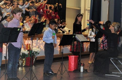 Kids singing on stage